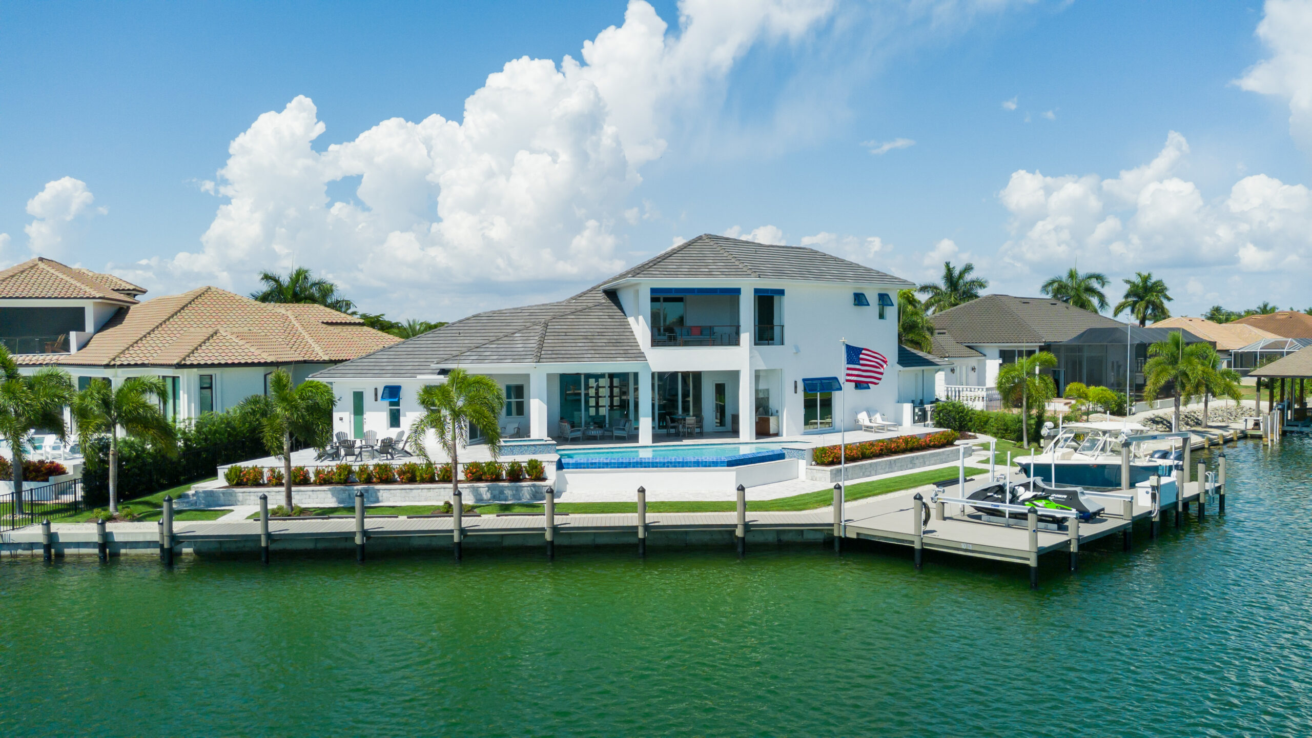 Image of luxury home on the waterfront to convey Custom Home Builder Marco Island