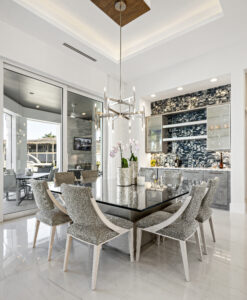 Image of a luxury dining room to convey the best Custom homes in Naples