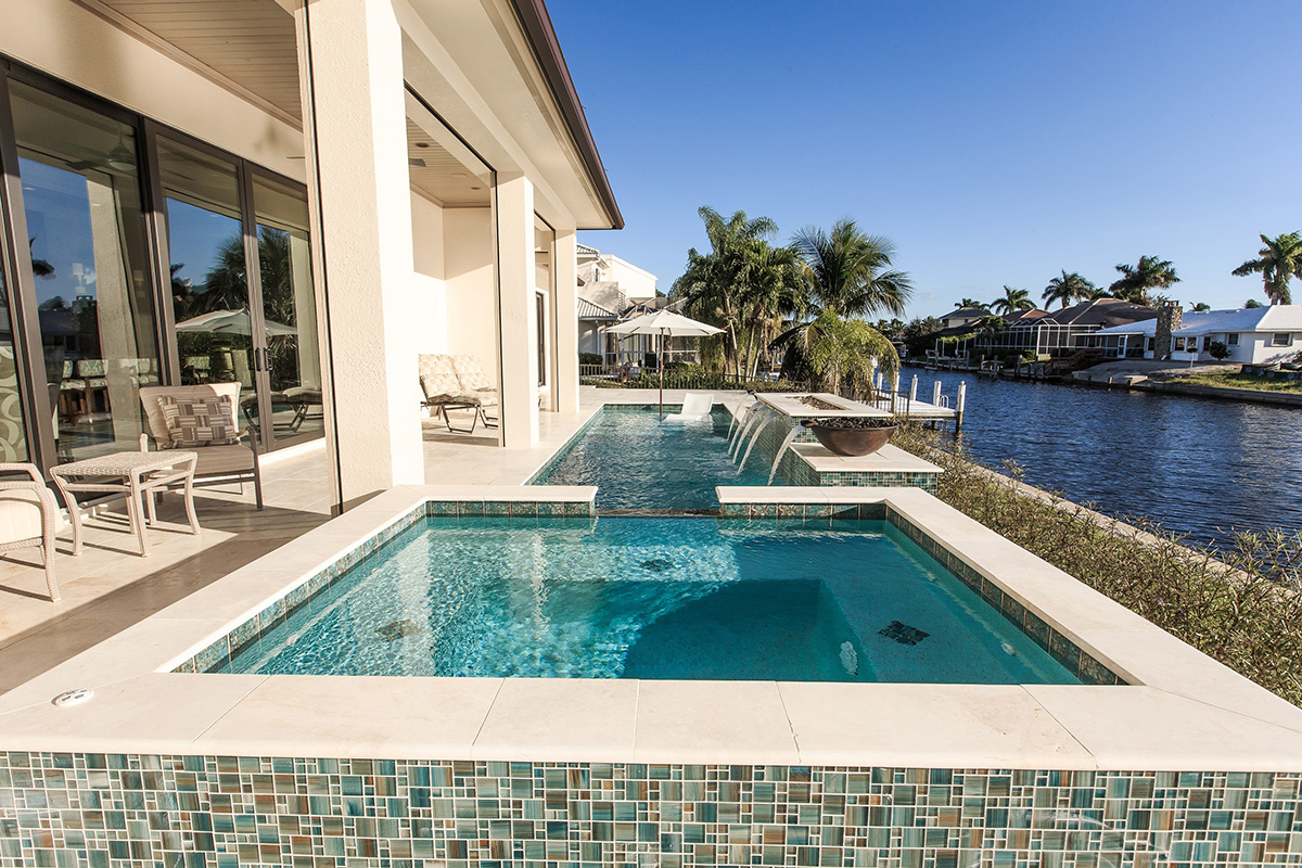 Image of a swimming pool to convey the benefits of Luxury Mansion Design Marco Island 